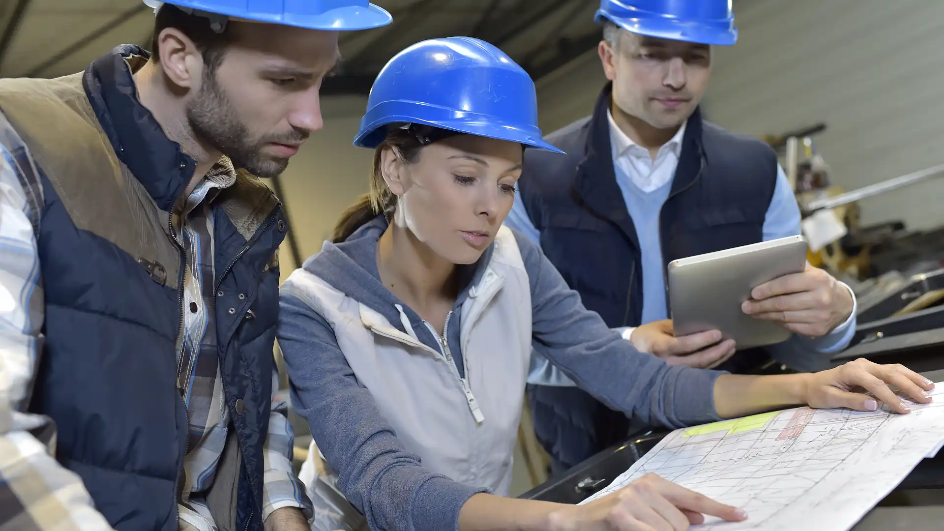 engineers meeting in mechanical factory for turnkey construction projects