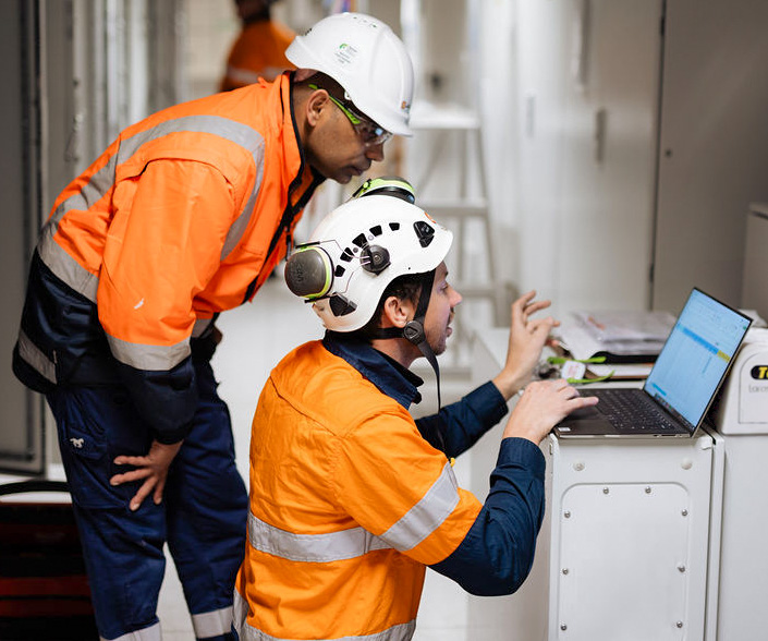 engineers meeting in mechanical factory for turnkey construction projects