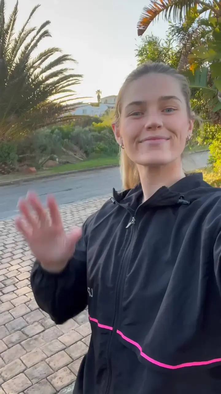 Jen waving GIF