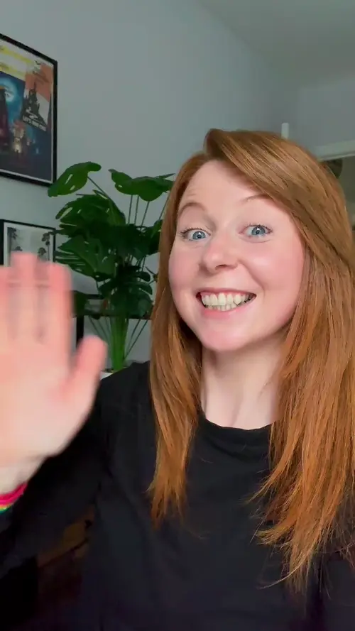 Nic waving GIF