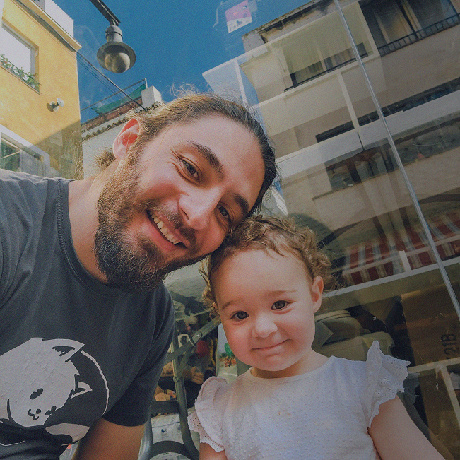 Photo of Virgil, full stack designer and his daughter, Emma