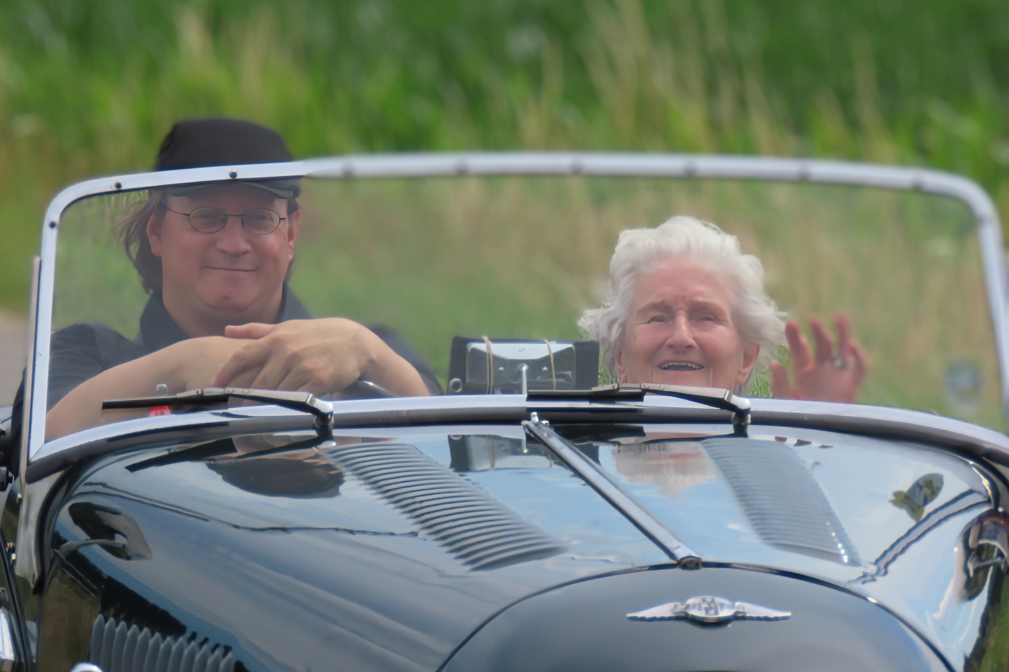 [background image] image of car on a scenic road (for an automotive service)