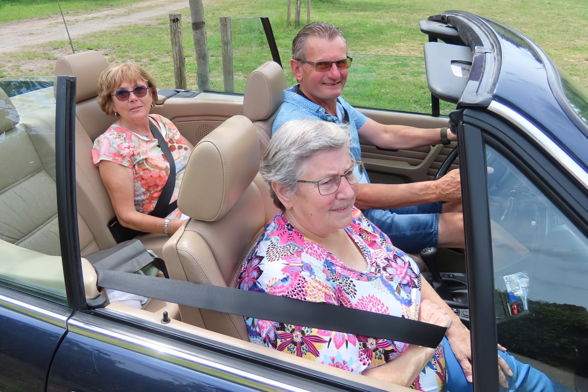 [background image] image of car on a scenic road (for an automotive service)