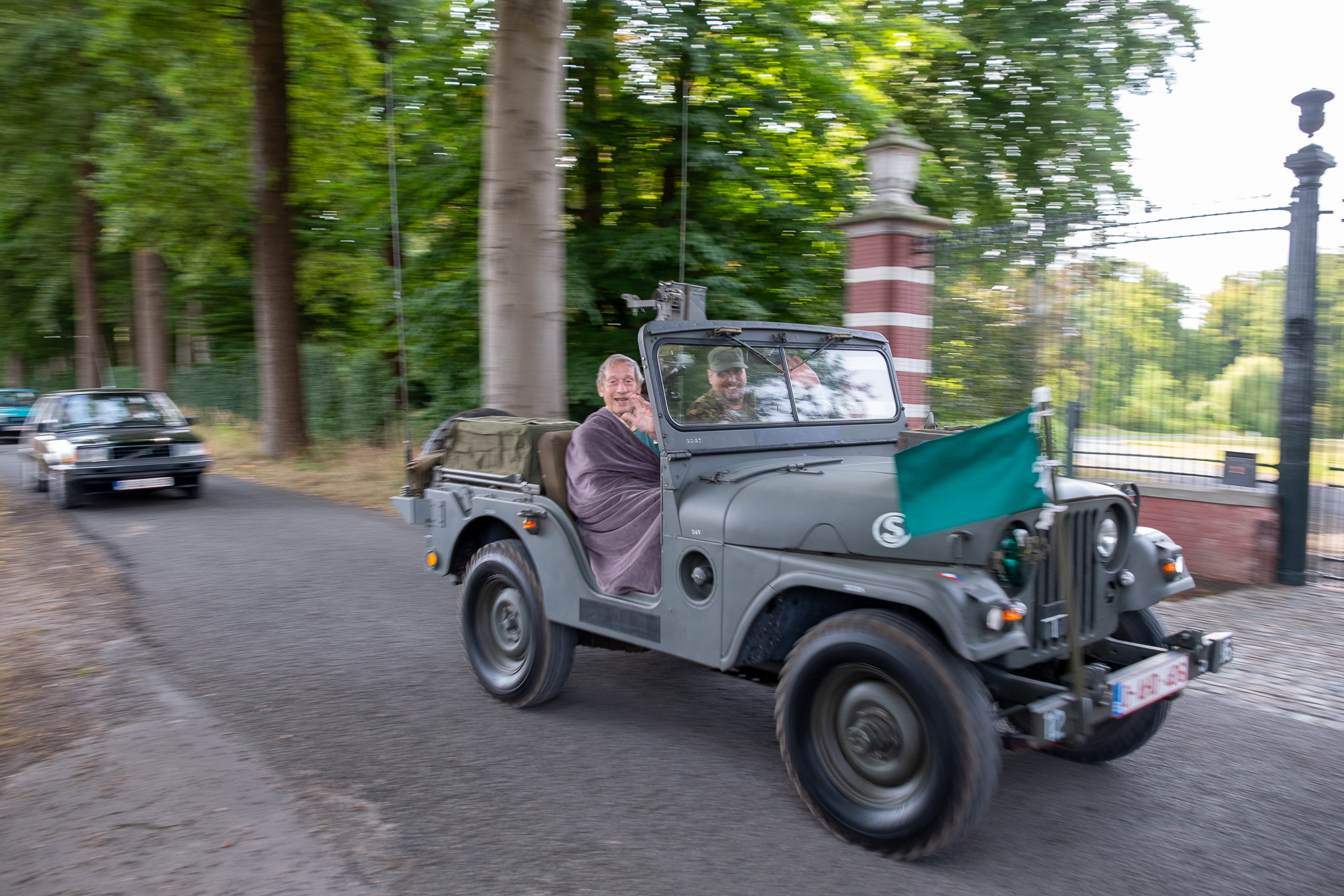 [background image] image of car on a scenic road (for an automotive service)