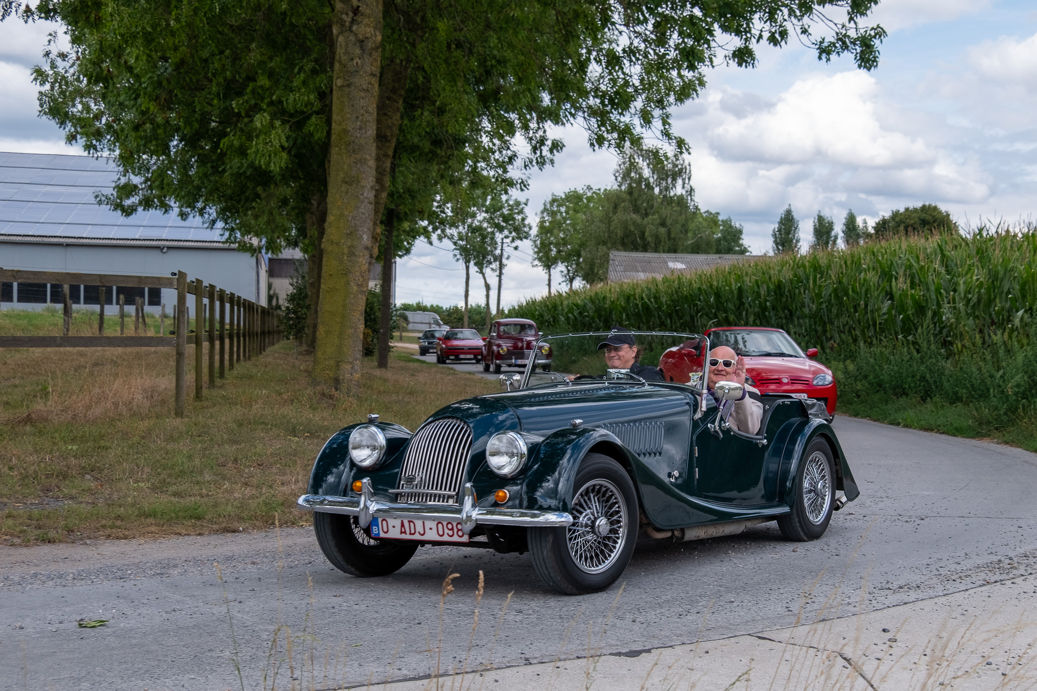[background image] image of car on a scenic road (for an automotive service)