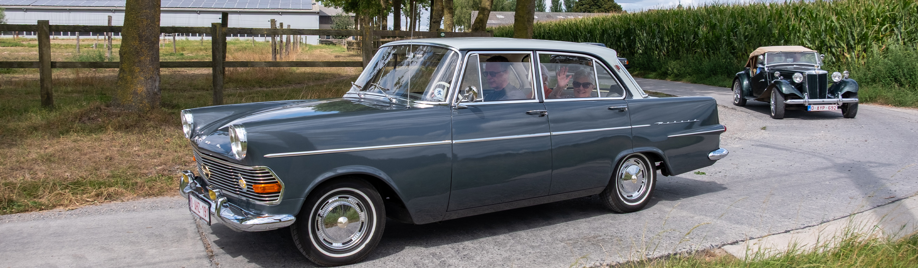 [background image] image of car on a scenic road (for an automotive service)