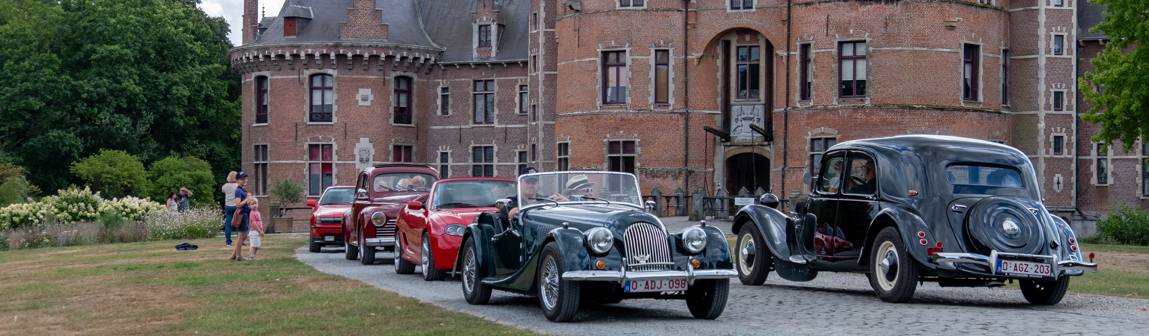 [background image] image of car on a scenic road (for an automotive service)