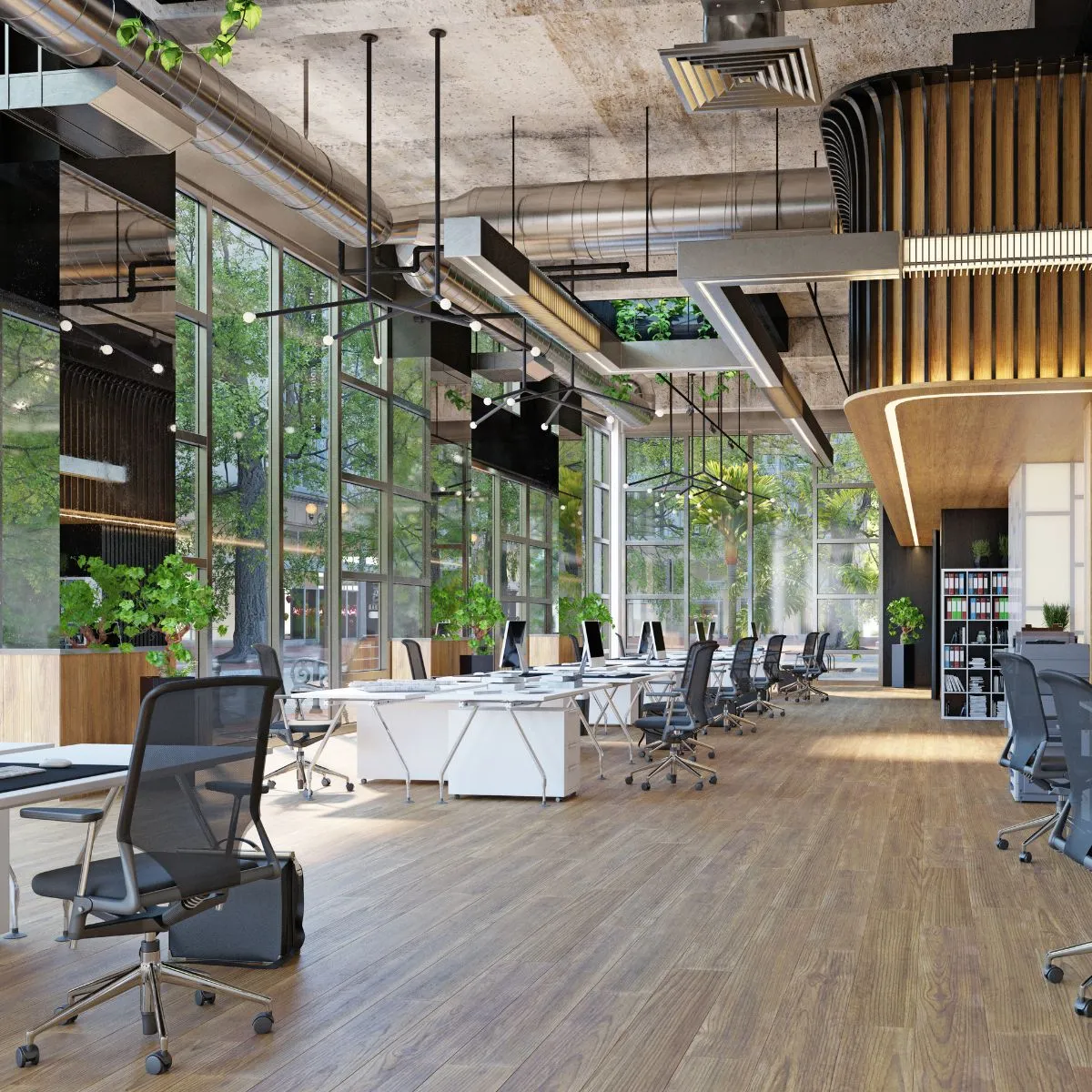 Picture of an incredibly large modern office with desks chairs and wall windows