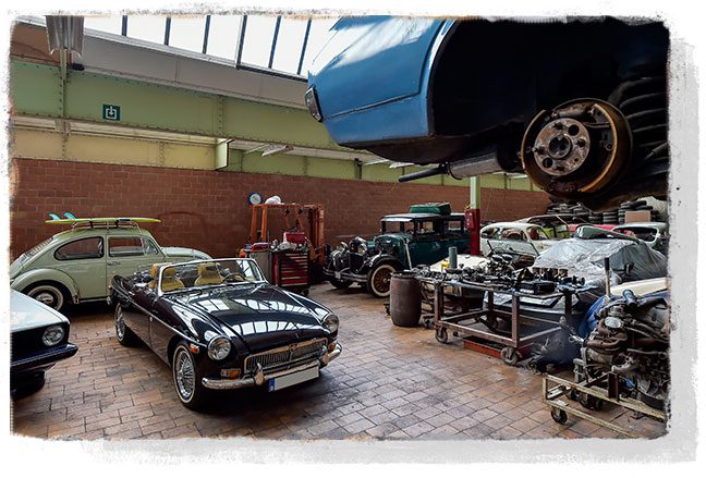 [background image] image of car on a scenic road (for an automotive service)