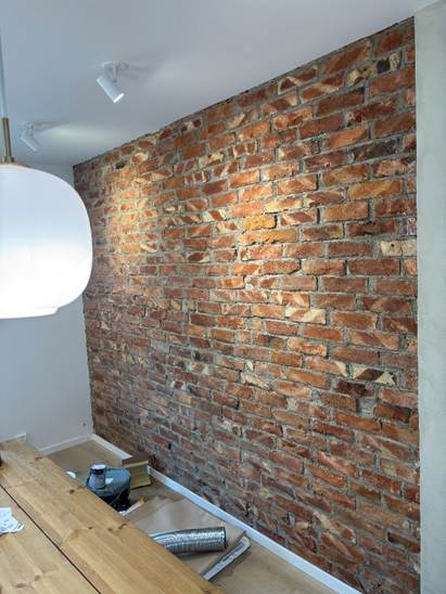 high resolution 4k photo of an artisan crafting furniture with sustainable materials