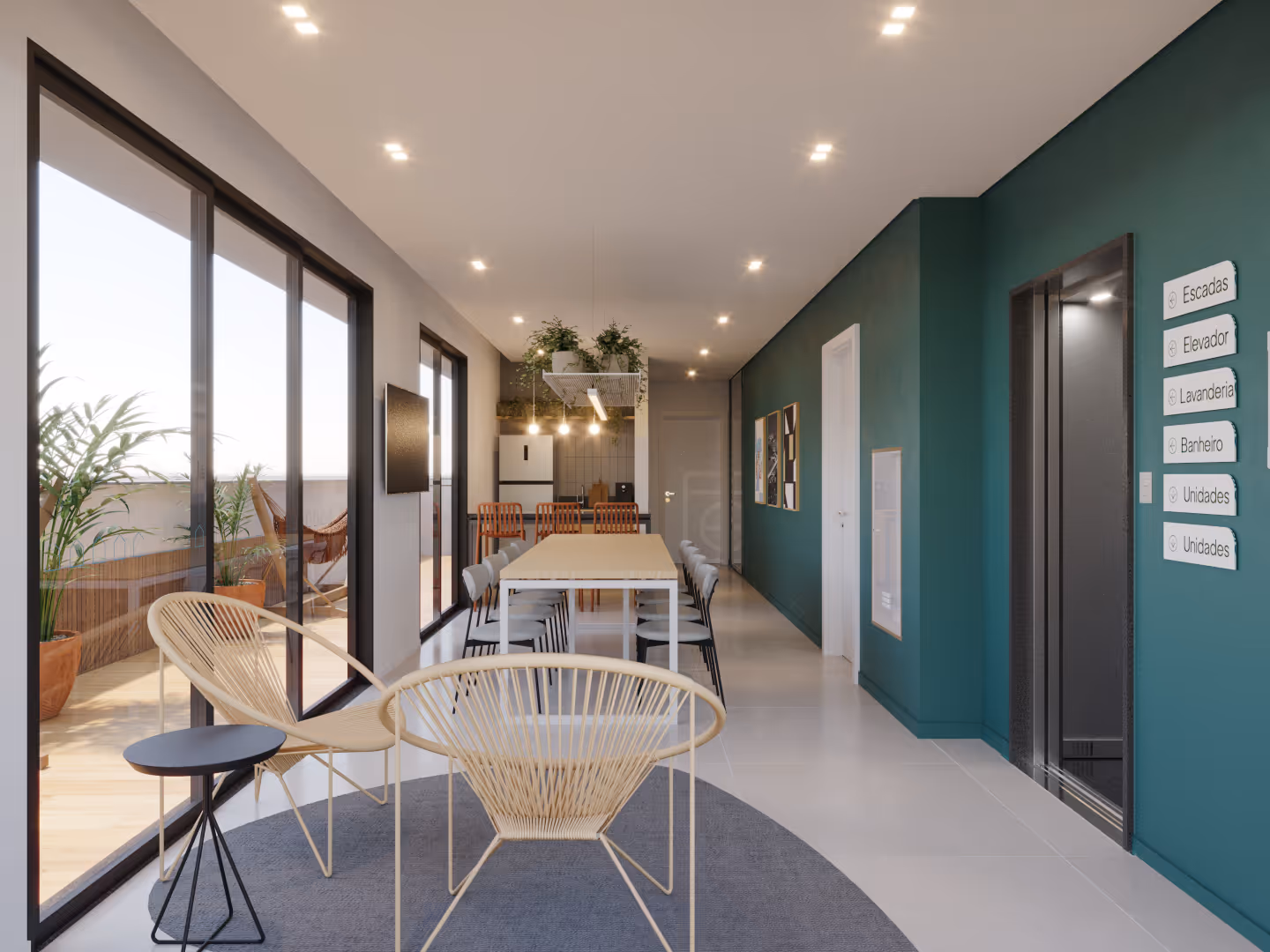 Hall social do andar com poltronas de fibra, mesa comunitaria ao fundo, elevadores e sinalizacao das areas do predio