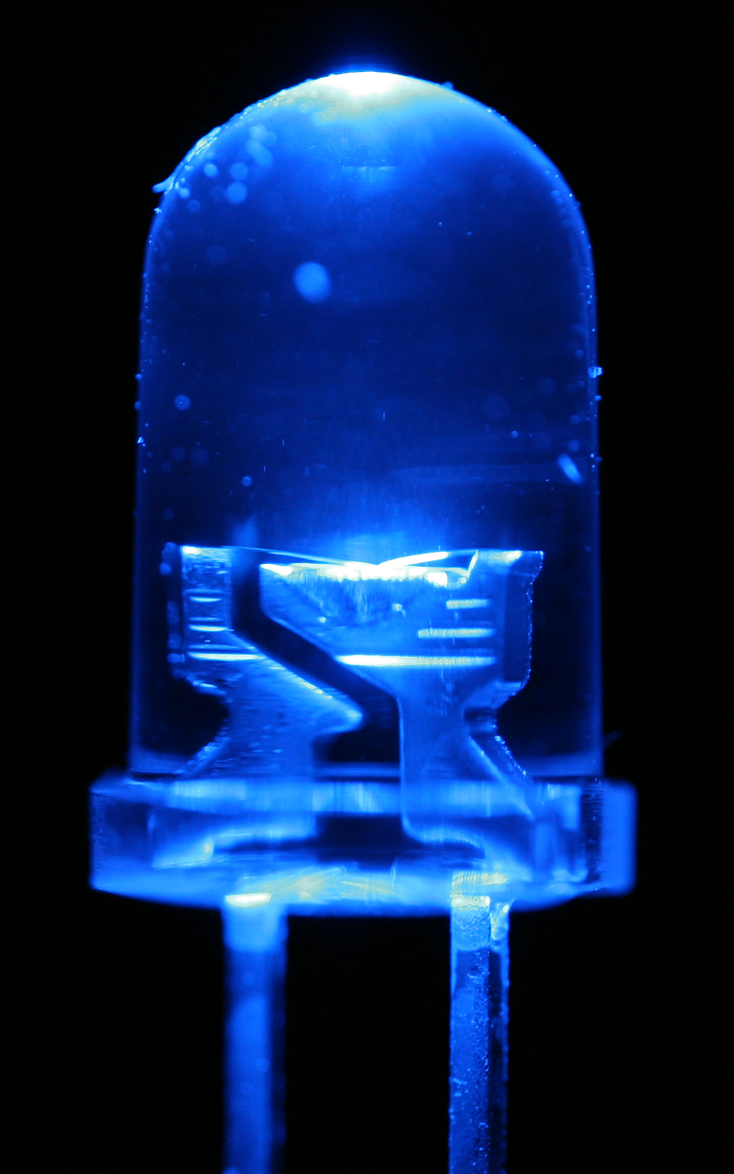 Close-up macro photograph of a blue light-emitting diode