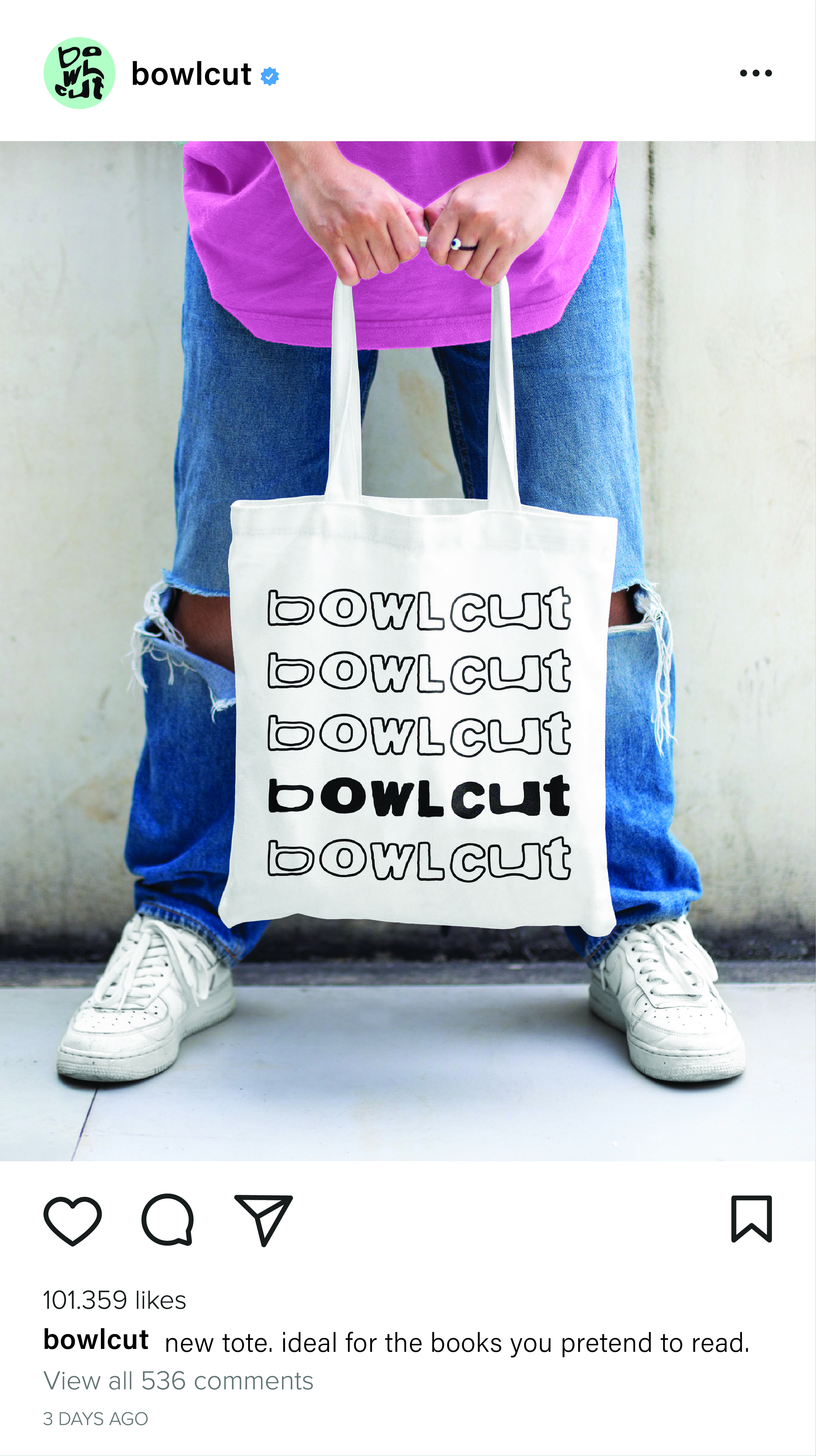 Person wearing ripped blue jeans and white sneakers holding a white tote bag with the word 'bowlcut' printed five times in different fonts.