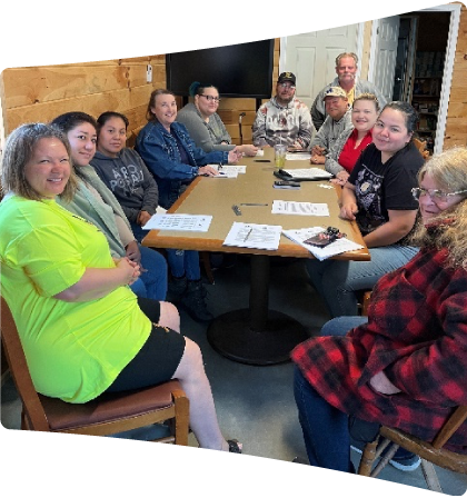 Residents meeting with Shanna Bradley to learn about resources available through the Salvation Army.