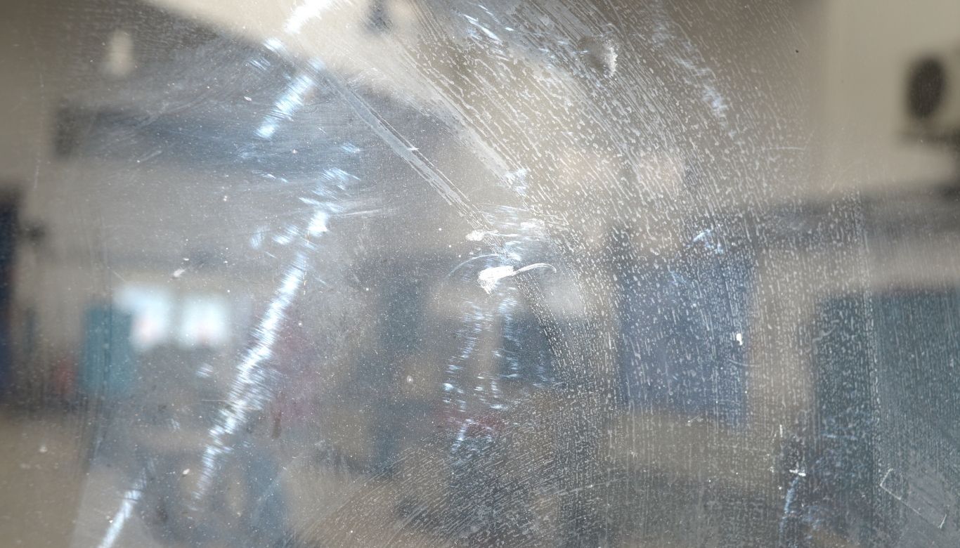 how to remove hard water spots from glass​