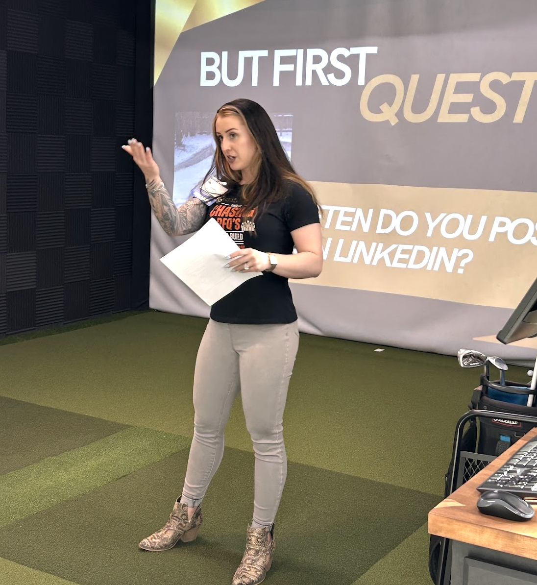 Lauren Krailo speaking about LinkedIn with papers in her hand