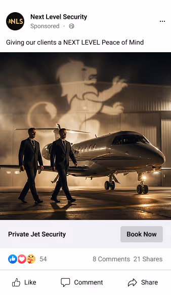 A retail store interior with a large screen displaying a snowy scene and clothing racks.