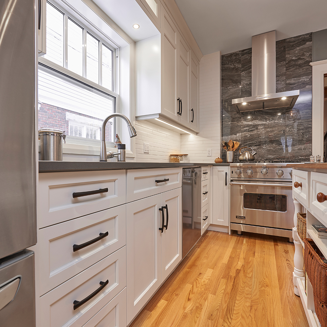 The space that usually exists between the counter and the stove is usually where dust collects and is a space that can never get cleaned, which is no one's favourite. So, instead we decided to design storage to close the gap.