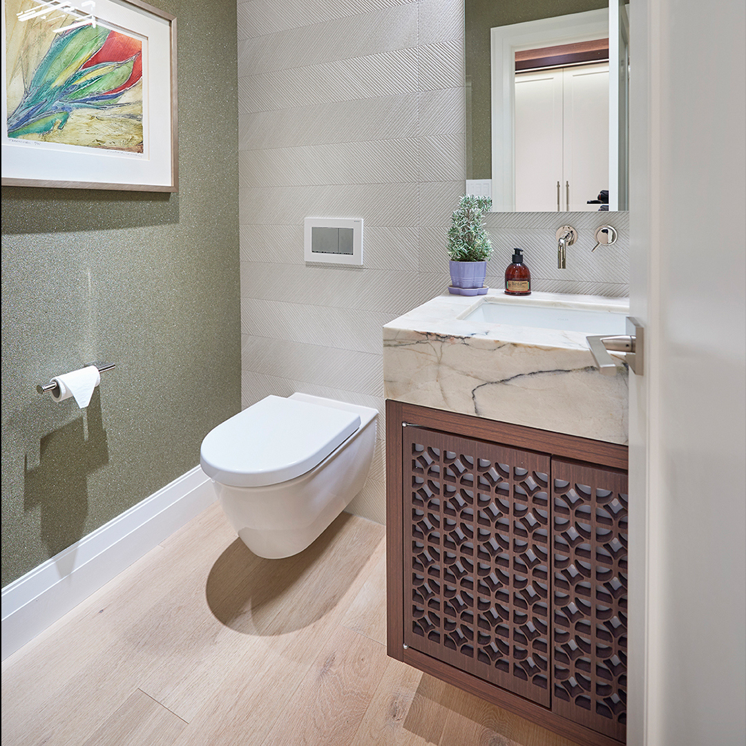 Layering textures creates a big impact in a smaller space like this Powder Room