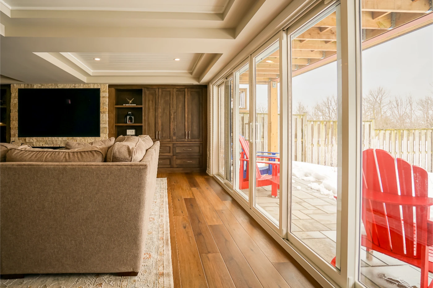 Maximizing Family Living: A Thoughtful Basement Addition with Outdoor Flow  - renovation project gallery image 2 by Pioneer Craftsmen