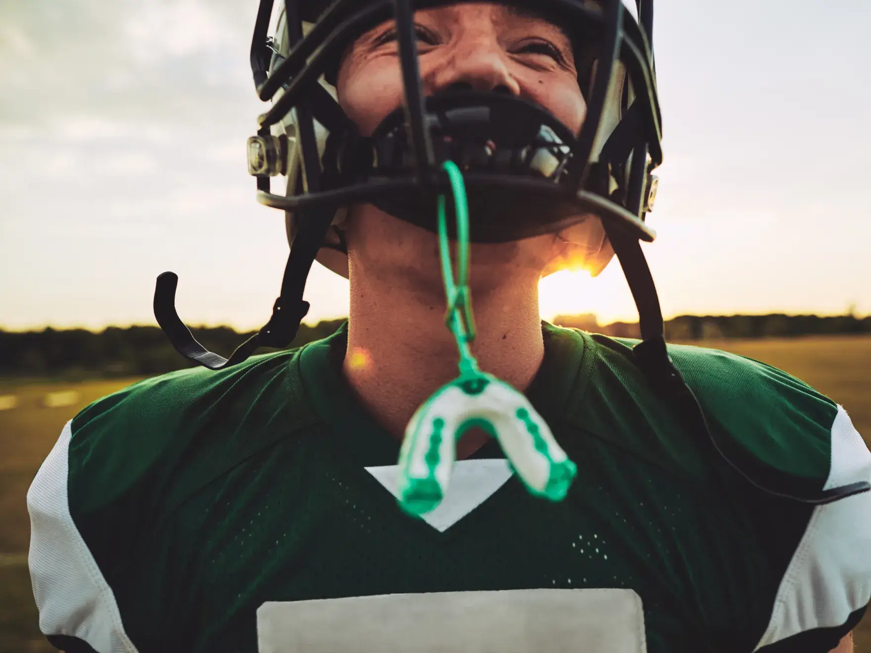 a man wearing a football uniform and a helmet
