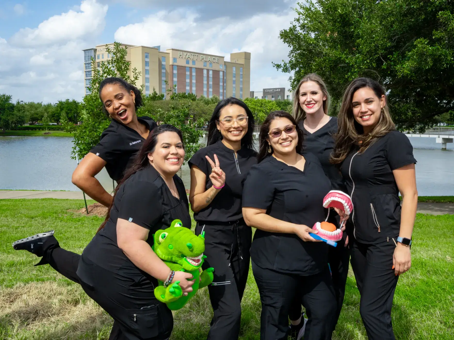 a group of women standing next to each other