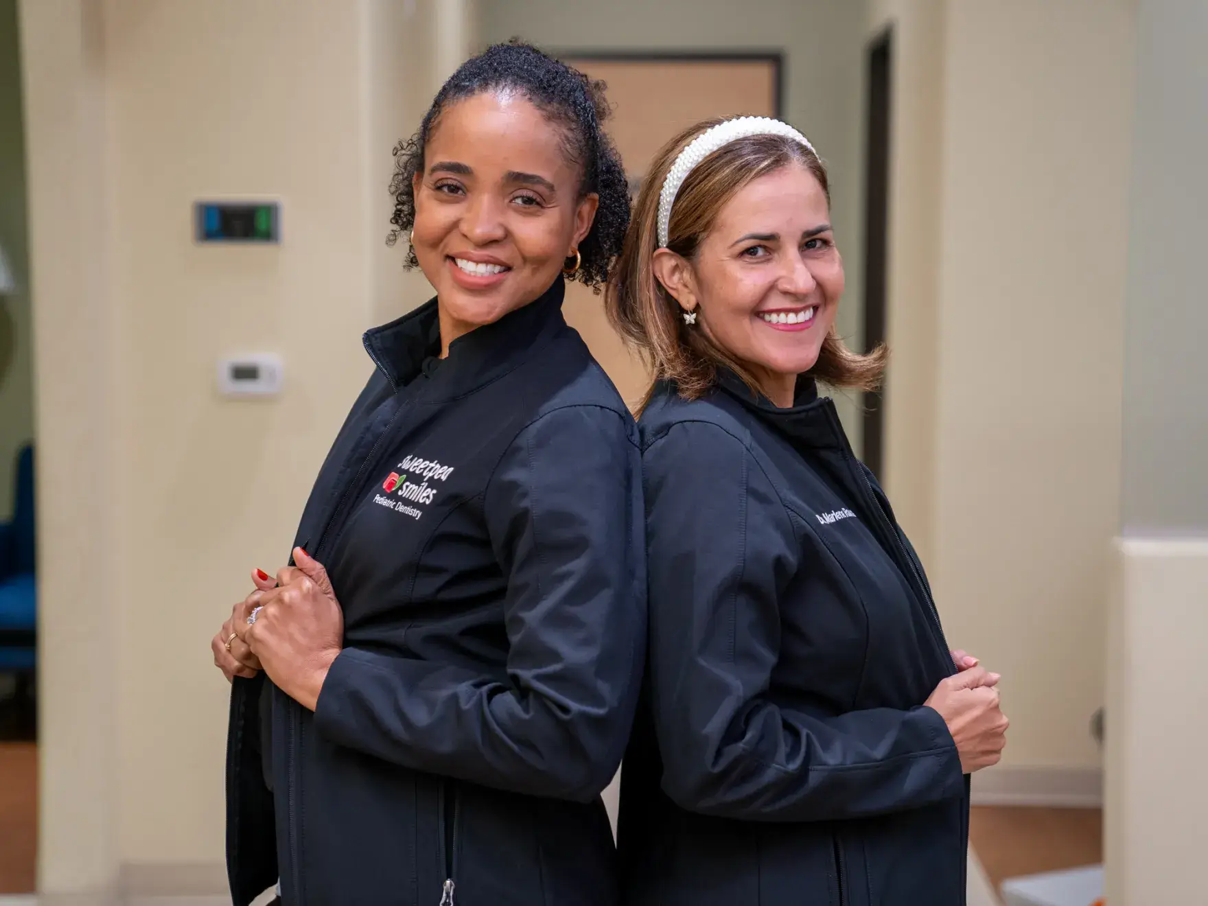 a couple of women standing next to each other