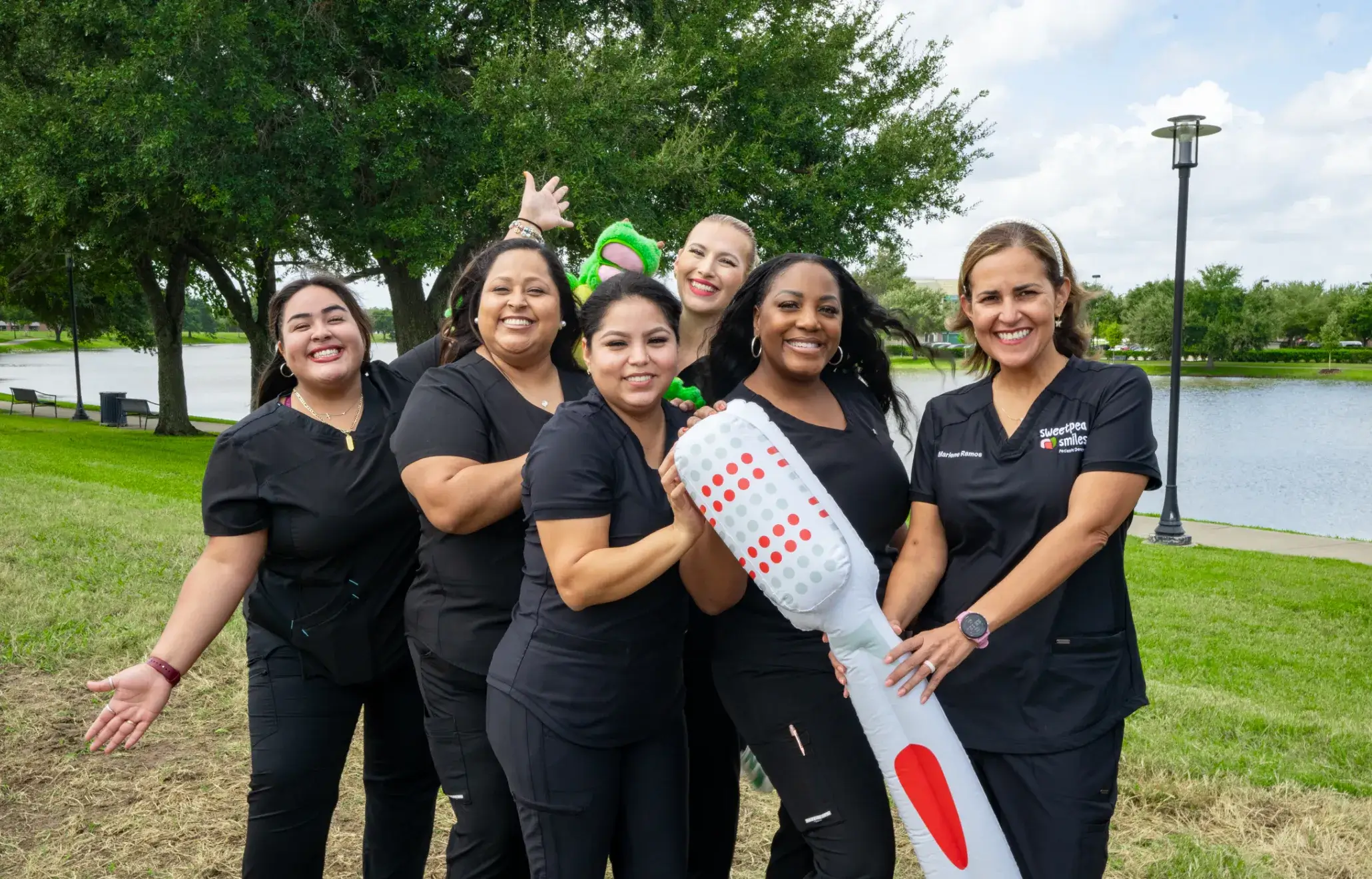 a group of women standing next to each other