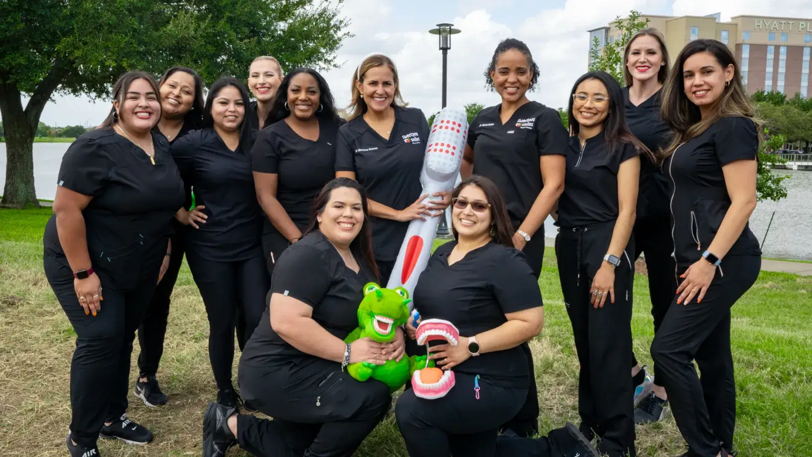 a group of women standing next to each other