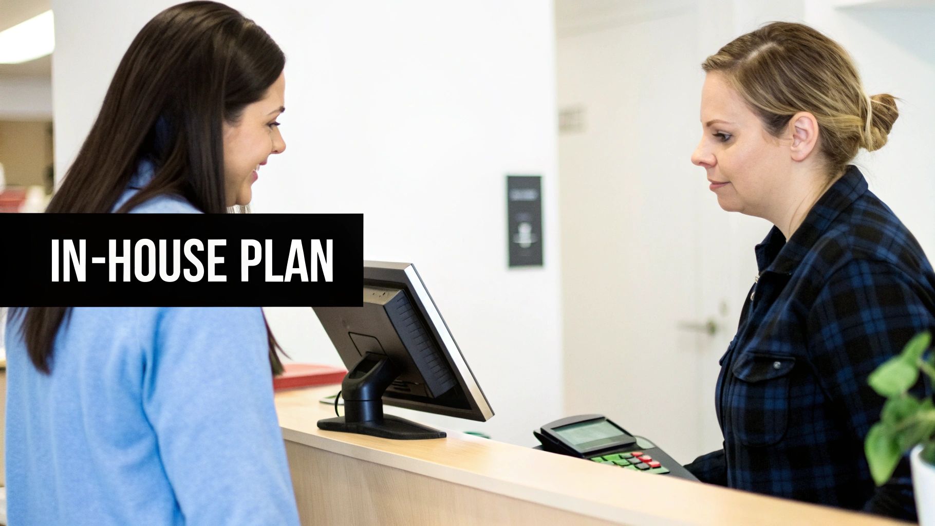 A person discussing financing options with a friendly clinic coordinator at a reception desk.