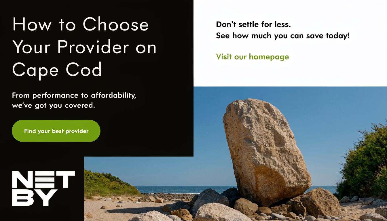 A scenic coastal landscape with large boulders on a sandy beach under a clear blue sky.