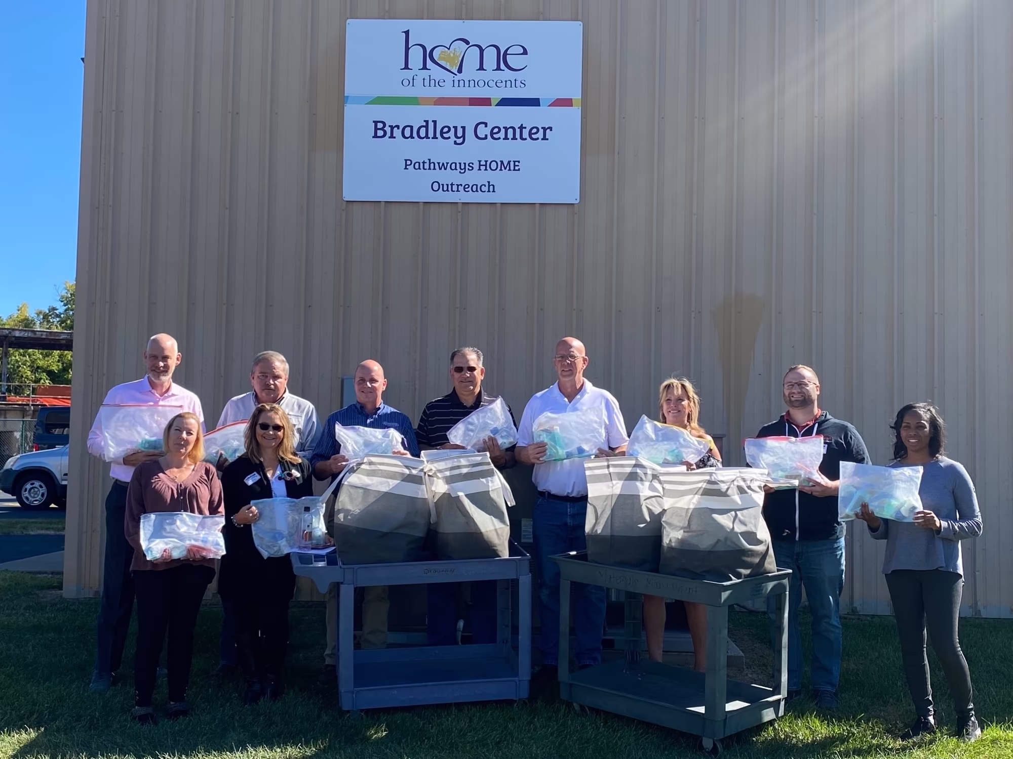 IEC Foundation members volunteering at Home of the Innocents - Bradley Center Pathways Home Outreach