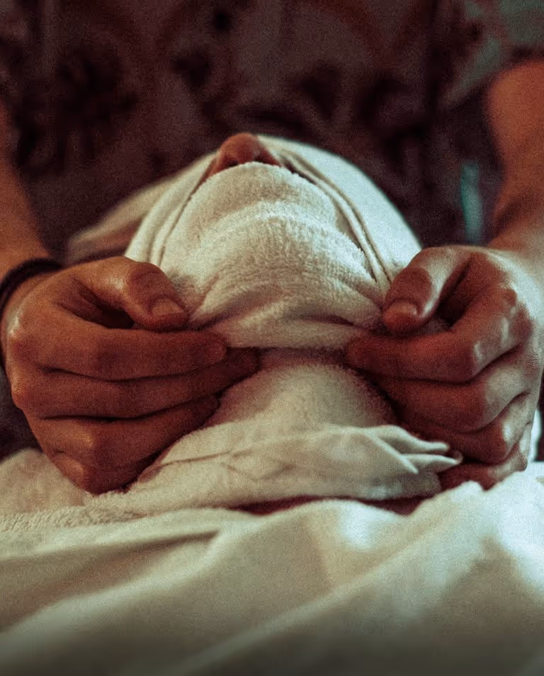 Hot towel treatment and traditional straight razor shave at The Chair Barbershop in Chicago