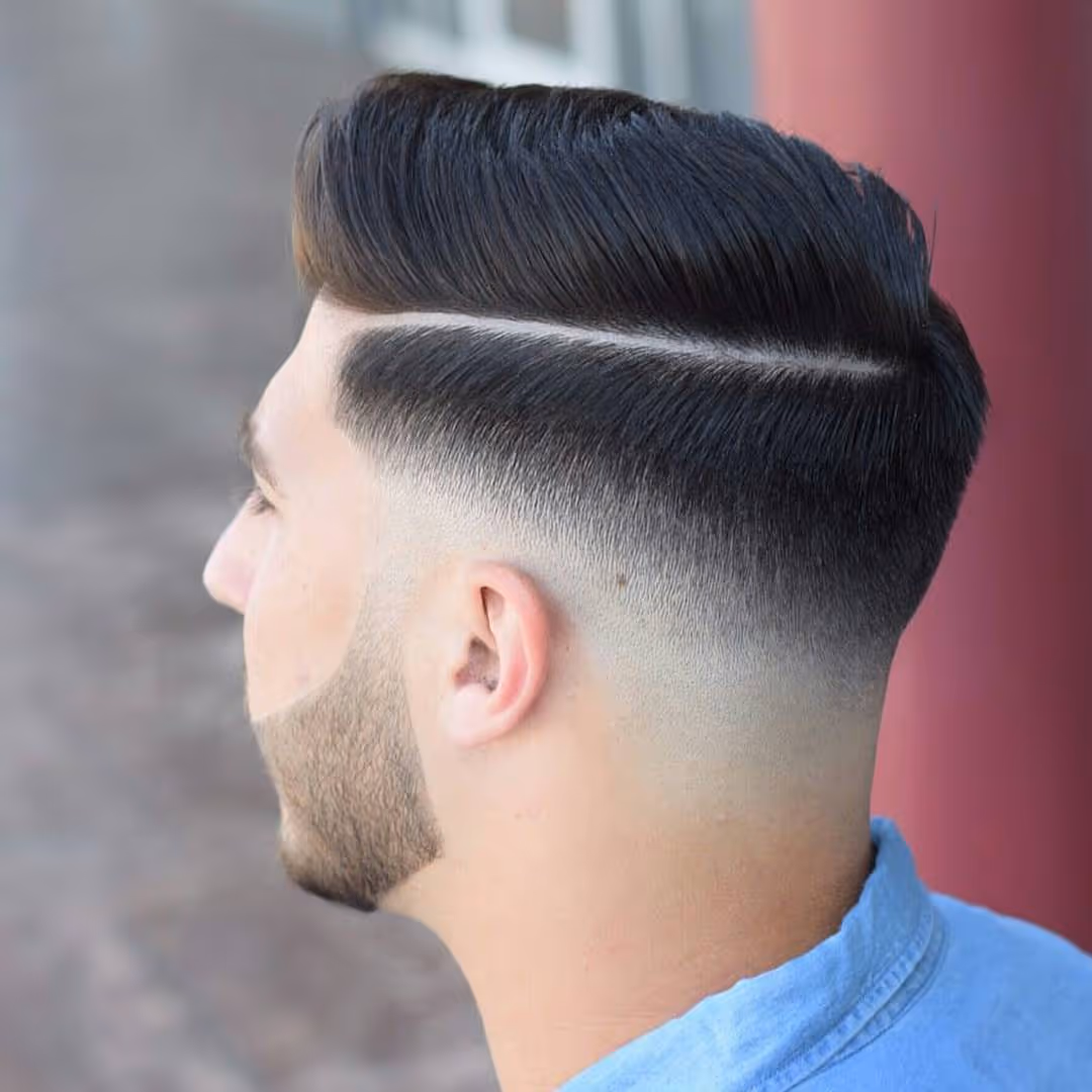 Low to high fade haircut with precise blending by expert barber at The Chair Barbershop Chicago