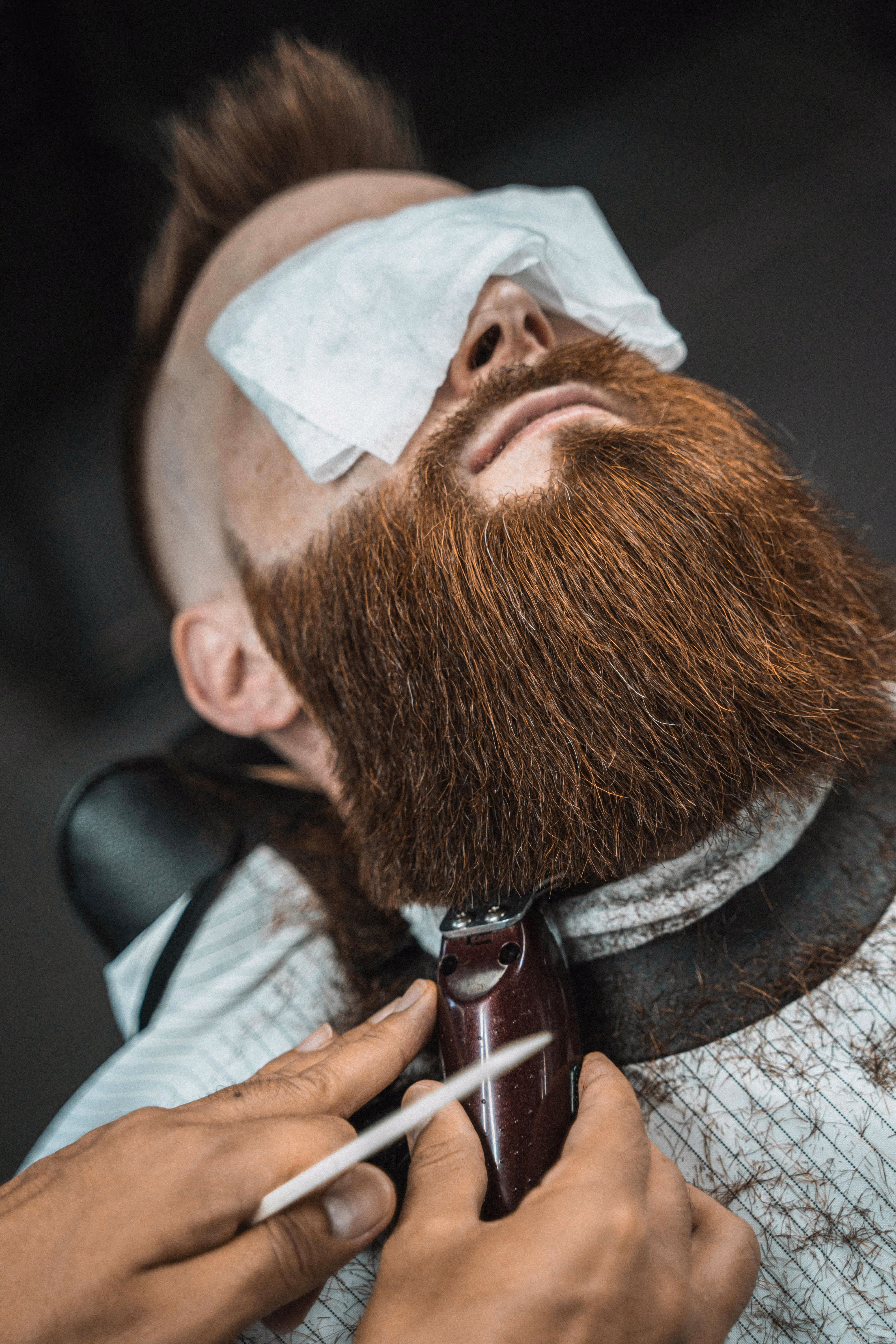 Hot towel beard treatment with straight razor shave at The Chair Barbershop in Chicago