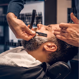Complete grooming package with haircut, shave, and style at The Chair Barbershop Chicago