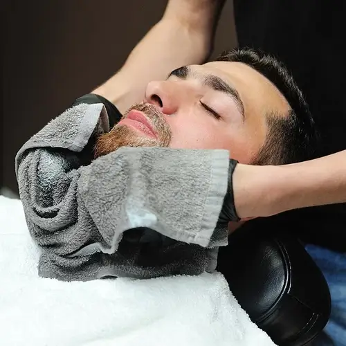Sharp hairline or beard edge-up with expert detail at The Chair Barbershop Chicago