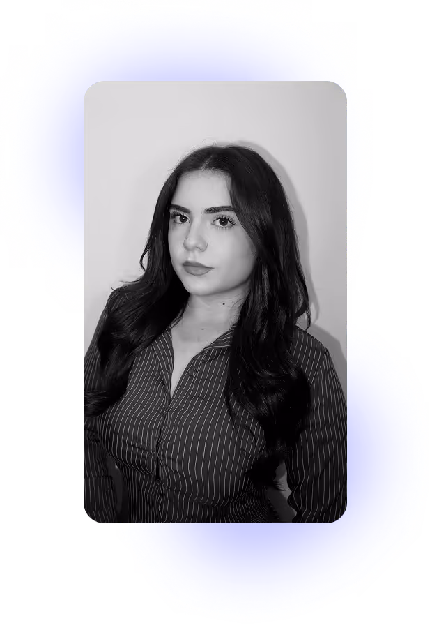 Black and white headshot of Rachelle with purple glow in the background