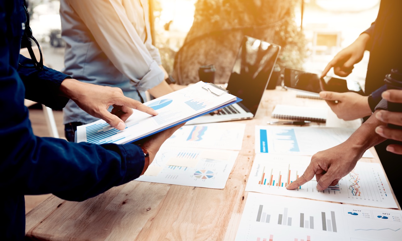 A business professional using an AI Copilot on their laptop to enhance productivity and automate tasks.