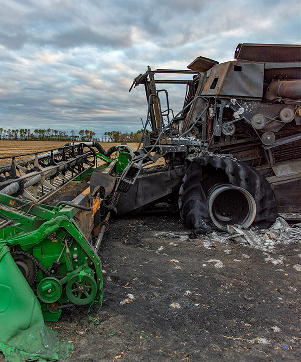Burnt out harvester caused by nesting starlings