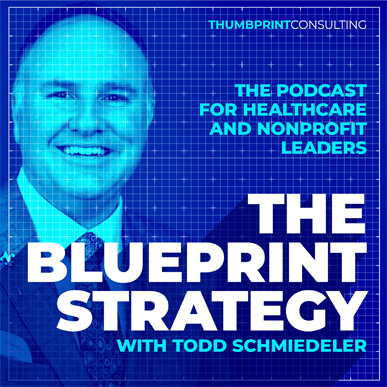 Blue background with image of a man smiling and the words, The Blueprint Strategy, in white