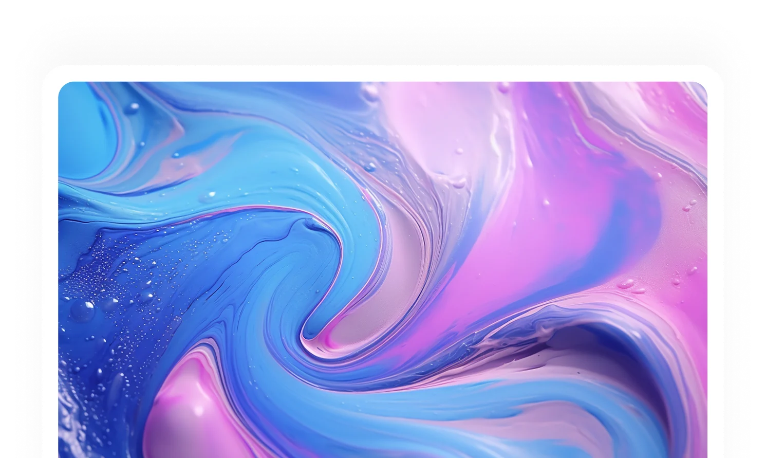 Abstract fluid swirl of blue, purple, and pink colors with small bubbles and smooth gradients.