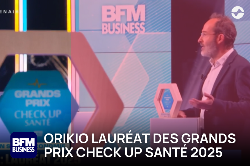 Photo de Gilles Debunne qui reçoit le prix sur le plateau de BFM