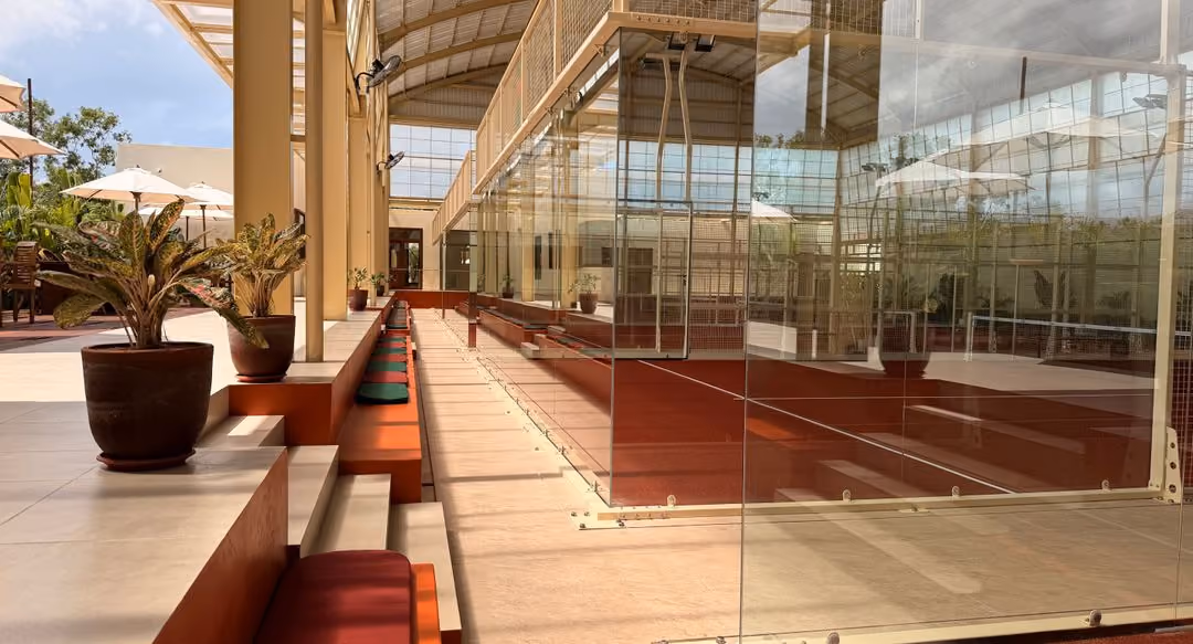 Club lounge and terrace beside the courts