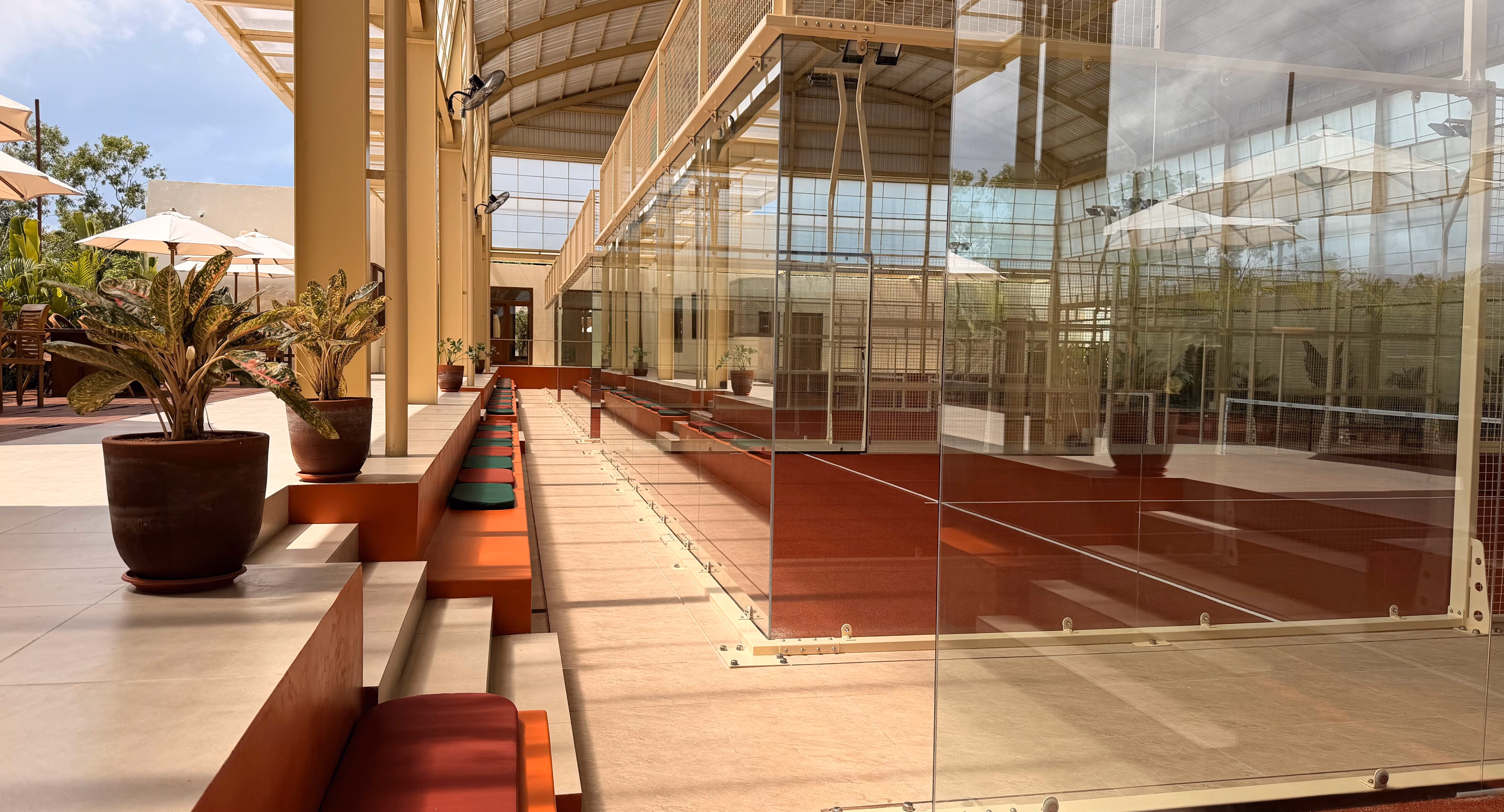 Club lounge and terrace beside the courts