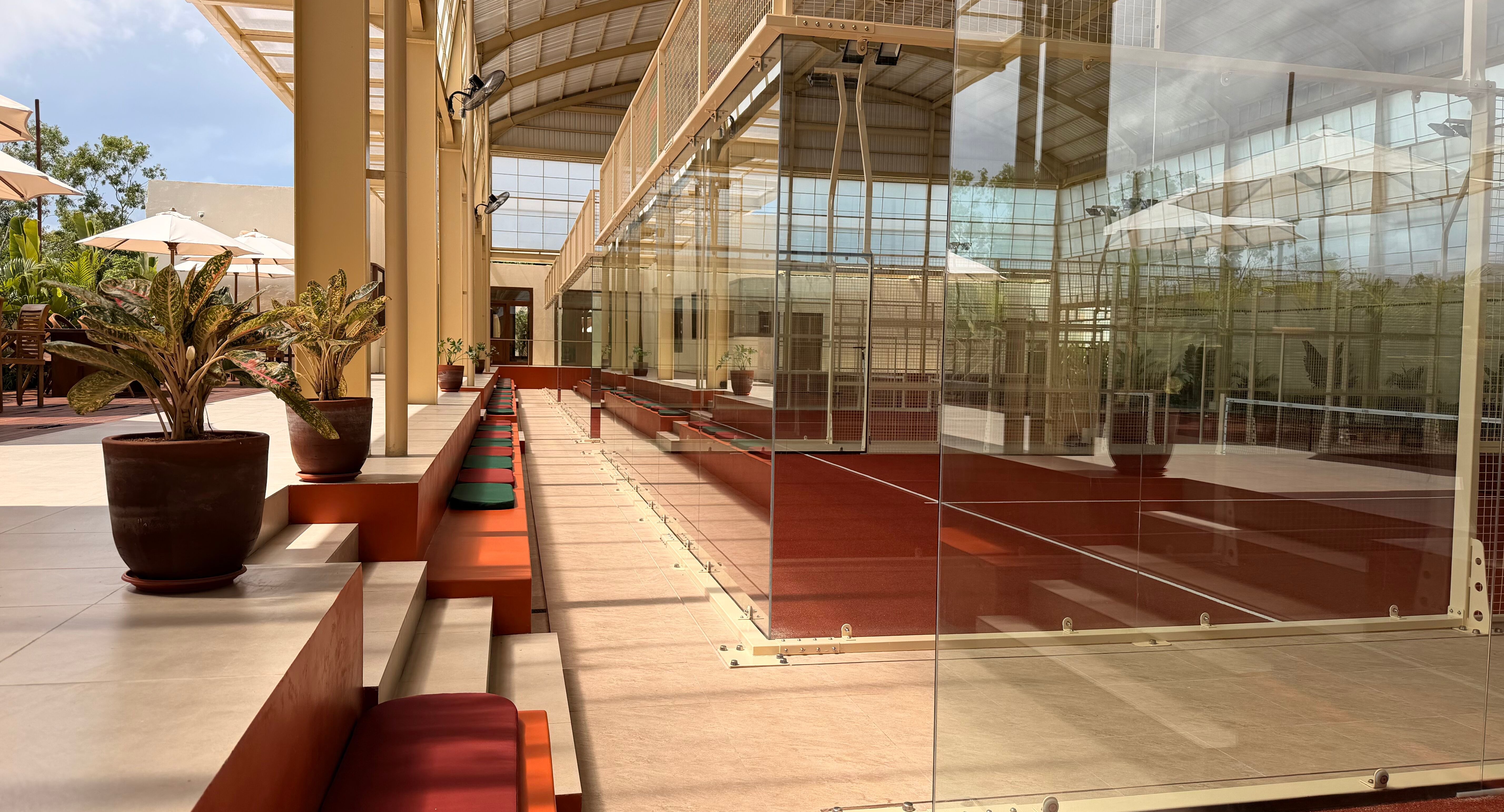 Club lounge and terrace beside the courts