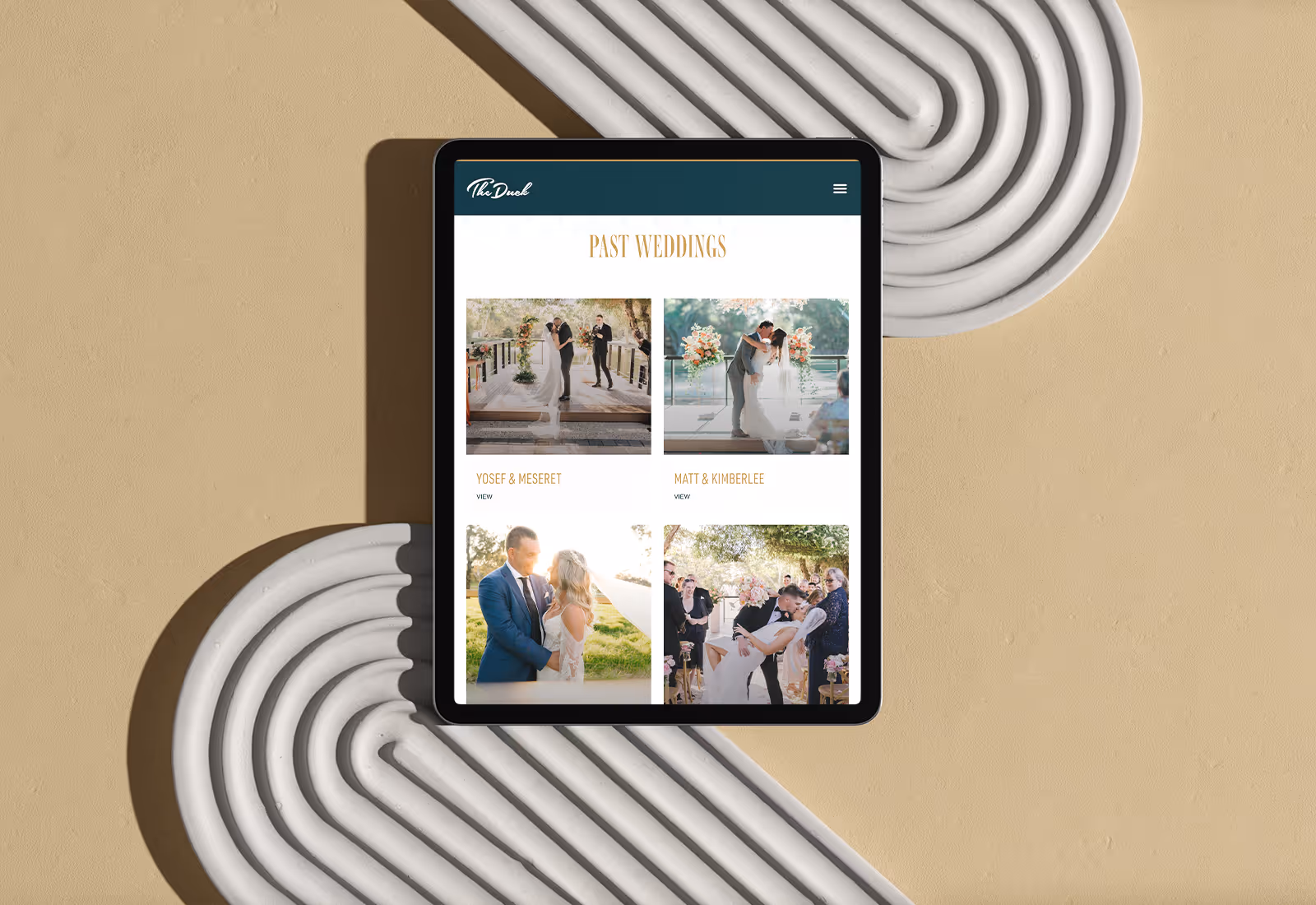 Tablet view of The Mallard Duck past weddings gallery featuring couples on the deck