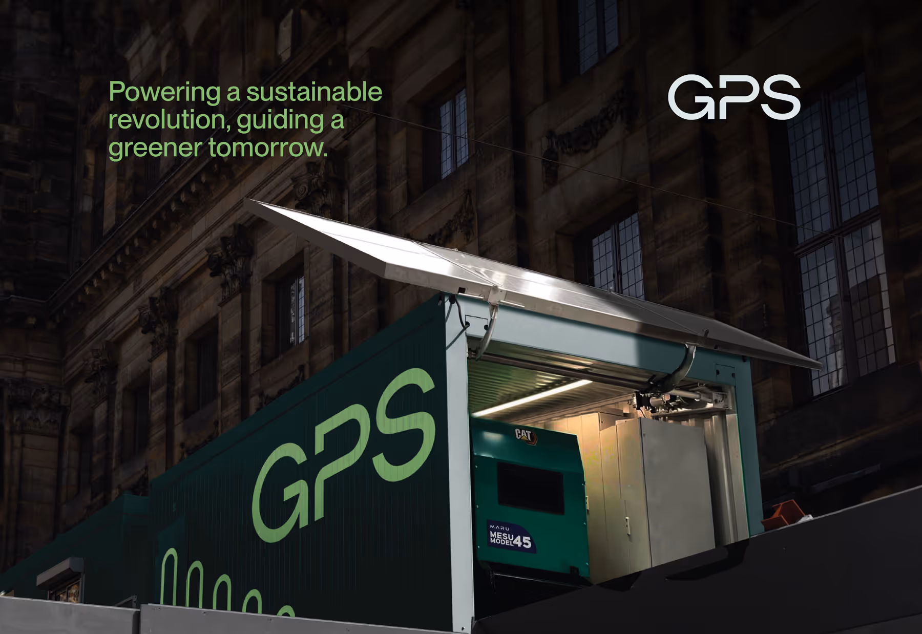 GPS-branded container with solar panels, set against the backdrop of an old city building and night lighting