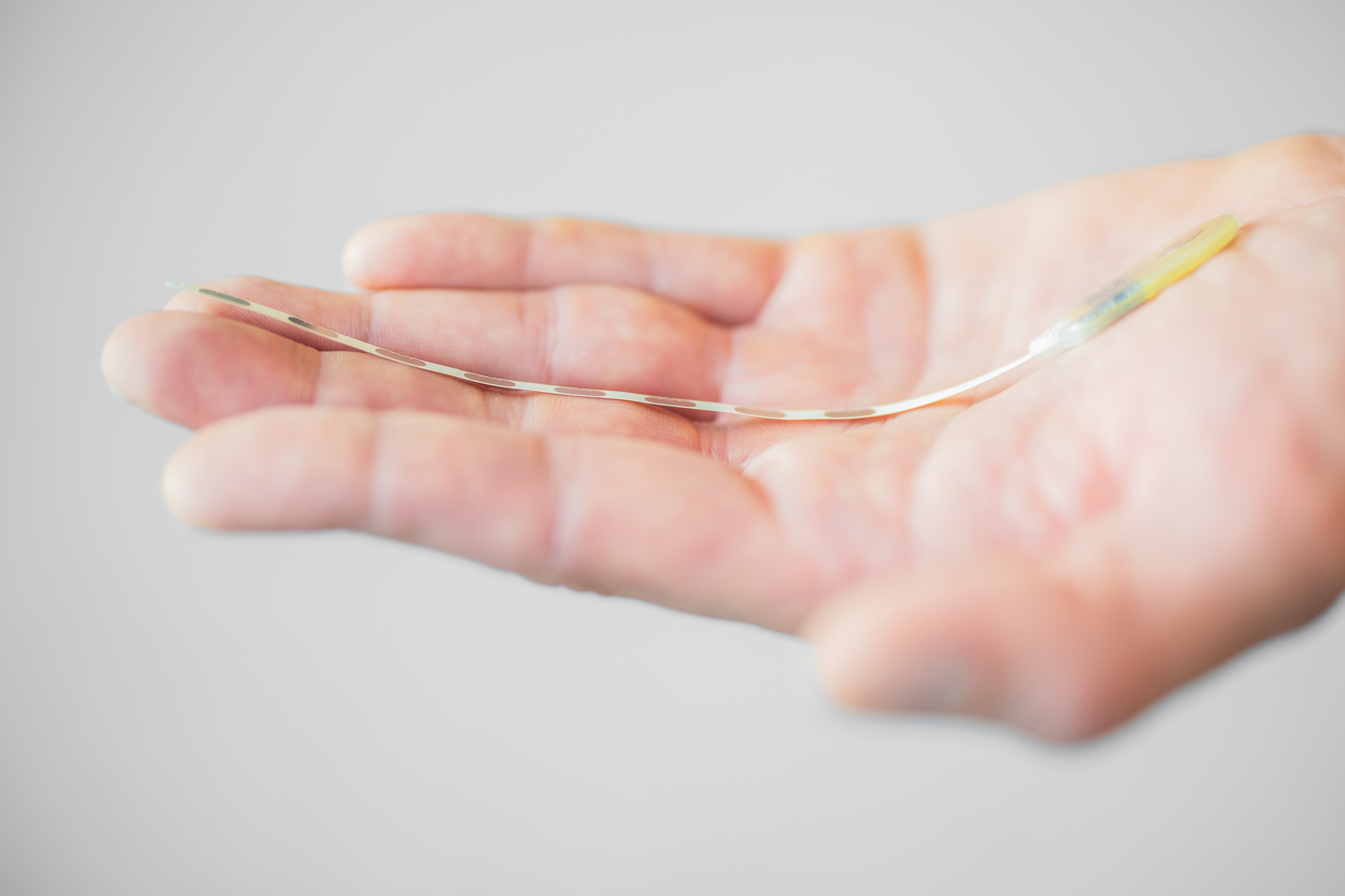 The ultra-thin implant that fits precisely in a human hand.