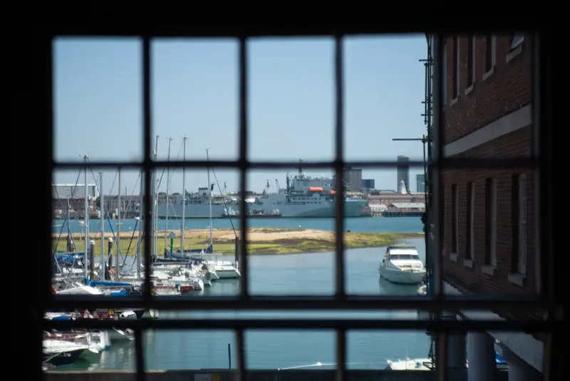 A view taken through an office window towards Portsmouth dockyard